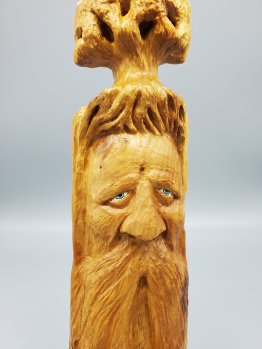 wood spirit tree top side